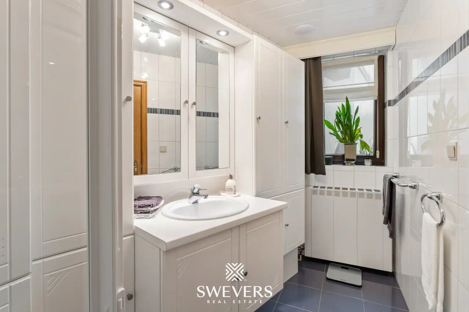 Ruim duplexappartement met grote veranda, riant terras, tuin en garage in hartje Lummen foto 15