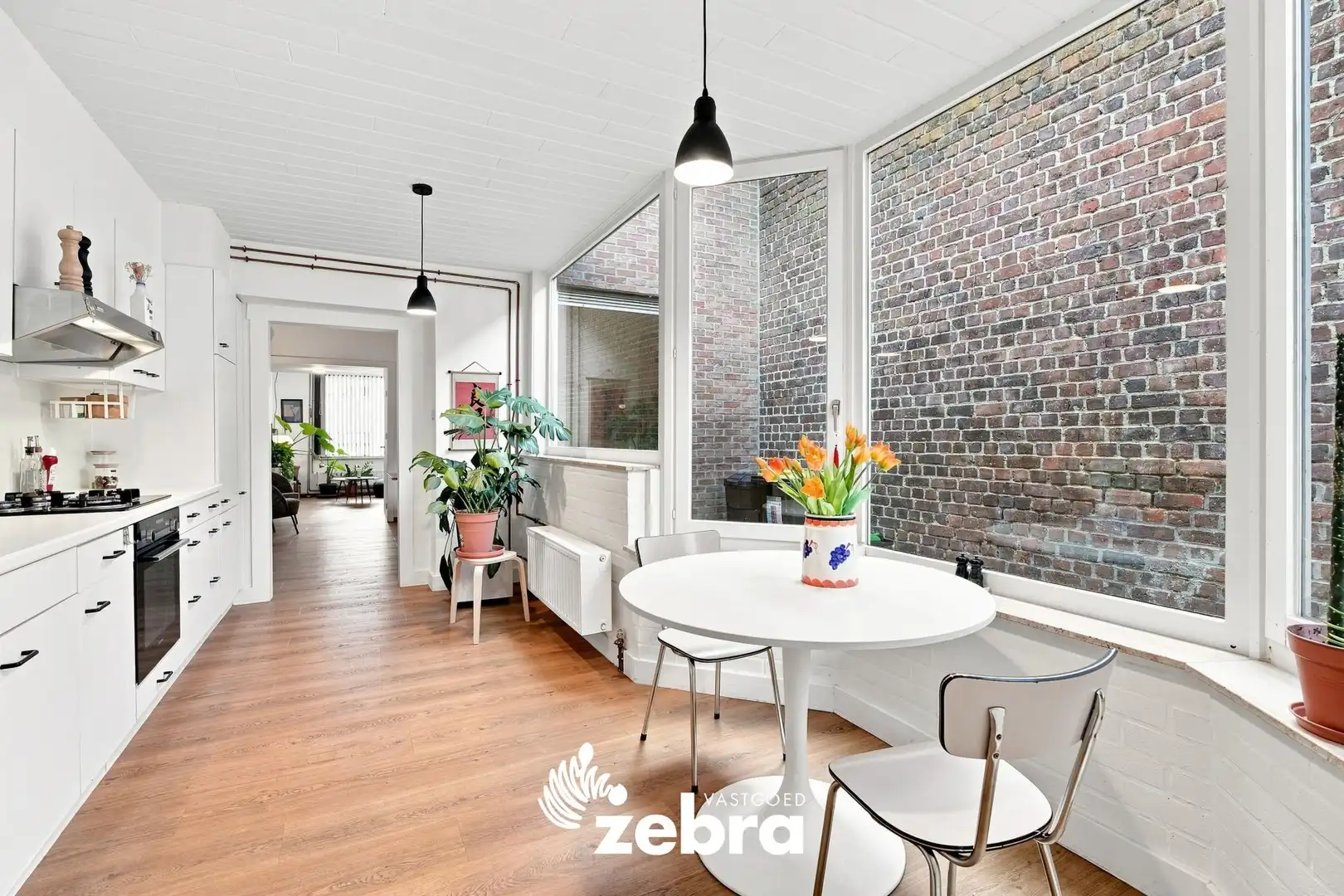Lichtrijke gezinswoning met 4 slaapkamers en prachtige westgerichte tuin! foto 6