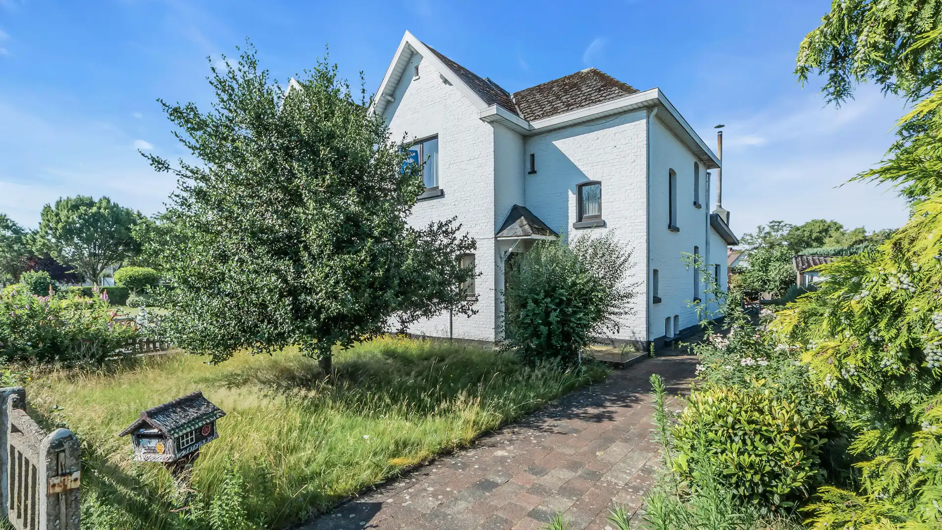 Hoofdfoto van de publicatie: Te renoveren woning (H.O.B.) met 3 slpkrs te Genk