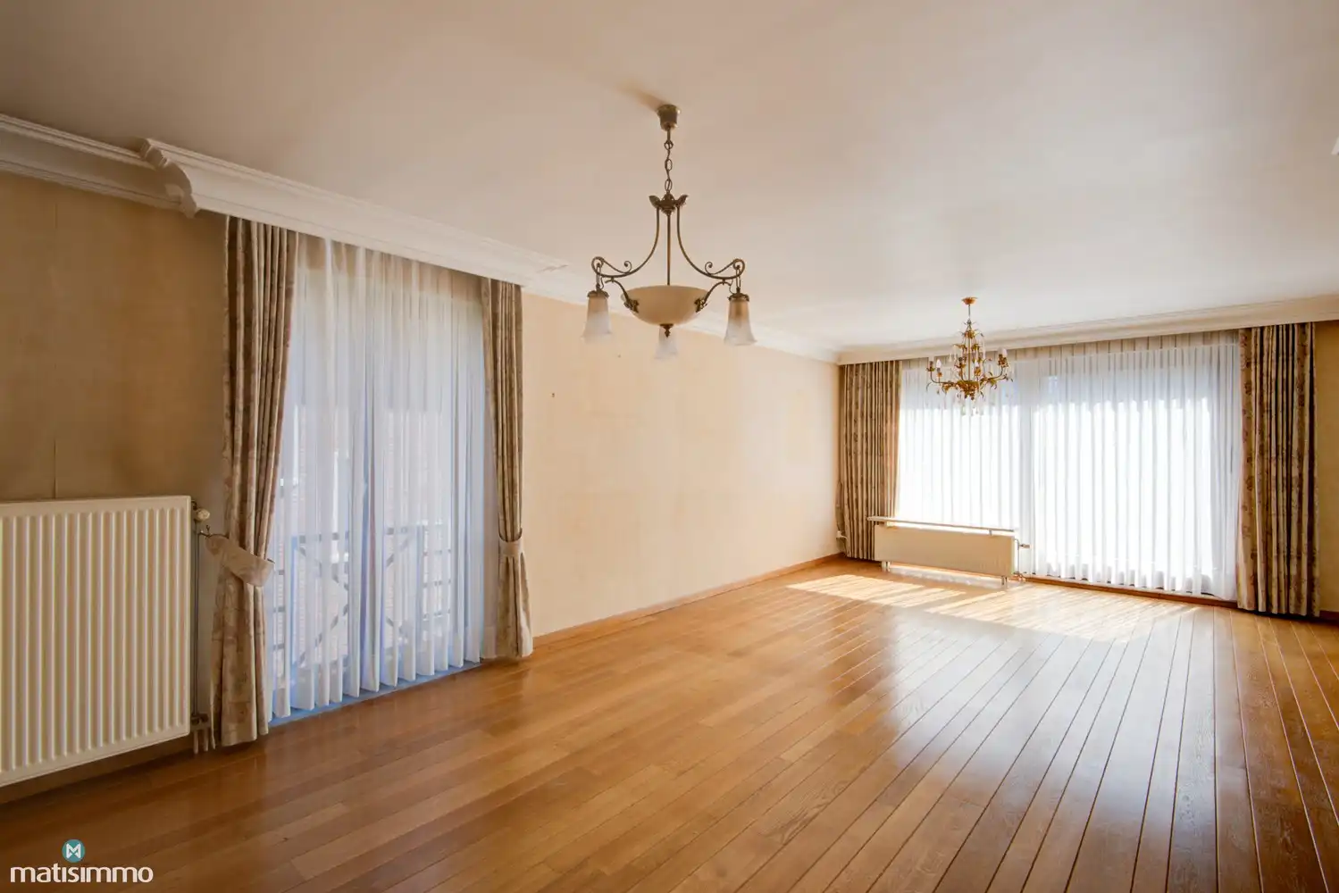 RUIM APPARTEMENT MET 2 SLAAPKAMERS, 2 TERRASSEN, KELDERBERGING EN ONDERGRONDSE AUTOSTAANPLAATS IN BILZEN-CENTRUM foto 2