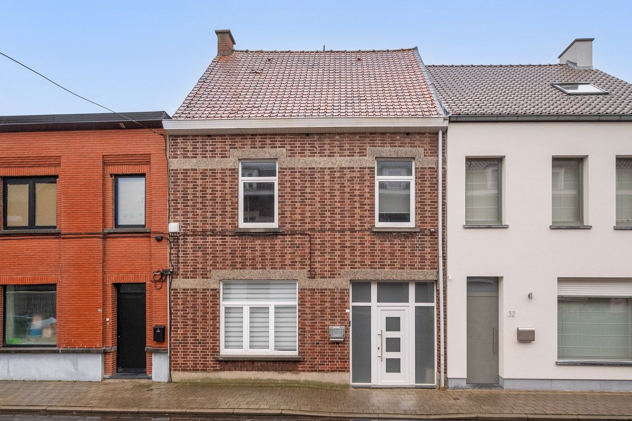 Bijzonder ruime woning in centrum Oudenaarde foto {{pictureIndex}}