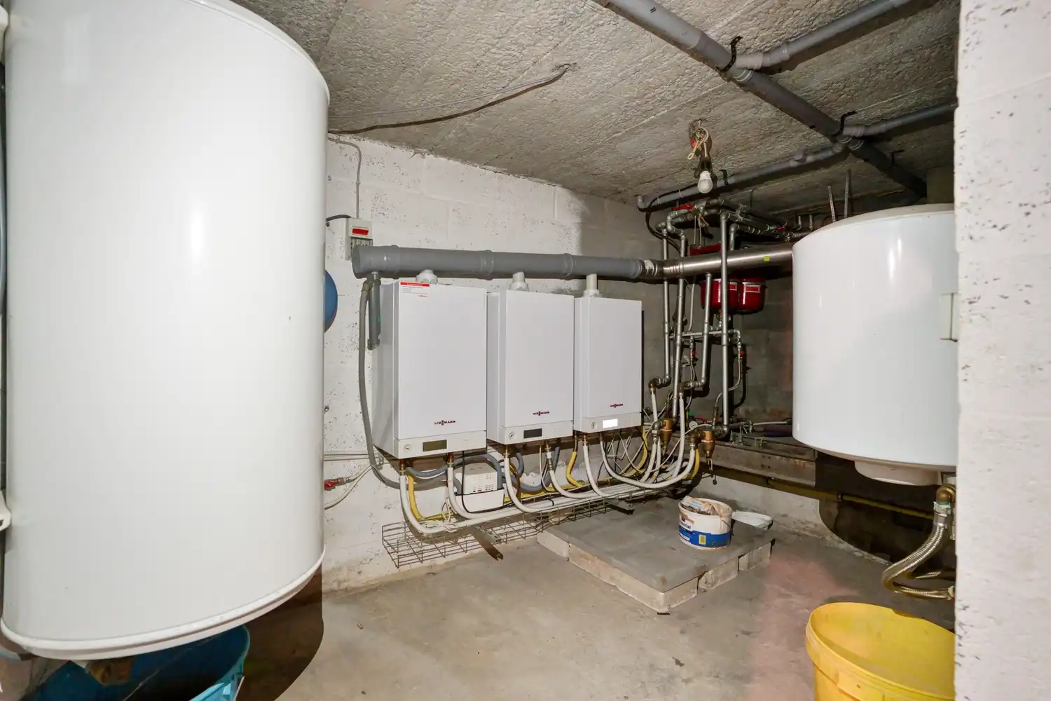 Gelijkvloers appartement met 2 slaapkamers, een ruim terras, 2 autostaanplaatsen, een kelder en een tuin grenzend aan de Vijvers van Bellefroid te Leuven! foto 18