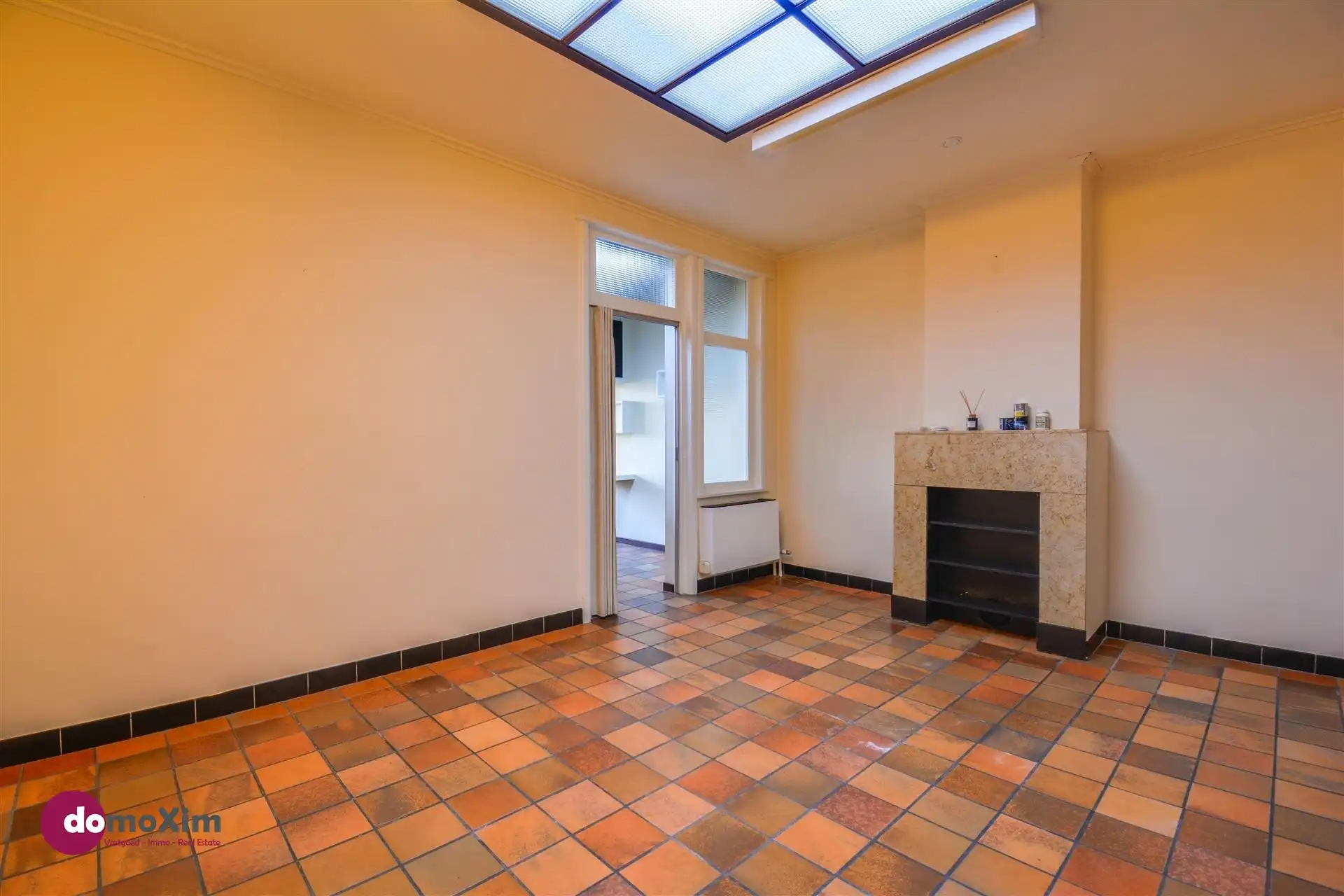 Ruime, karaktervolle stadswoning met twee garageboxen en tuin in Mechelen foto 6