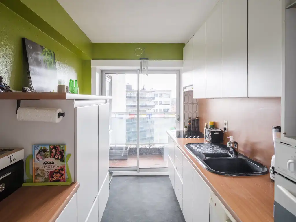 Ruim appartement met 2 slaapkamers en een zonnig terras, gelegen vlakbij het centrum van Gent. foto 7