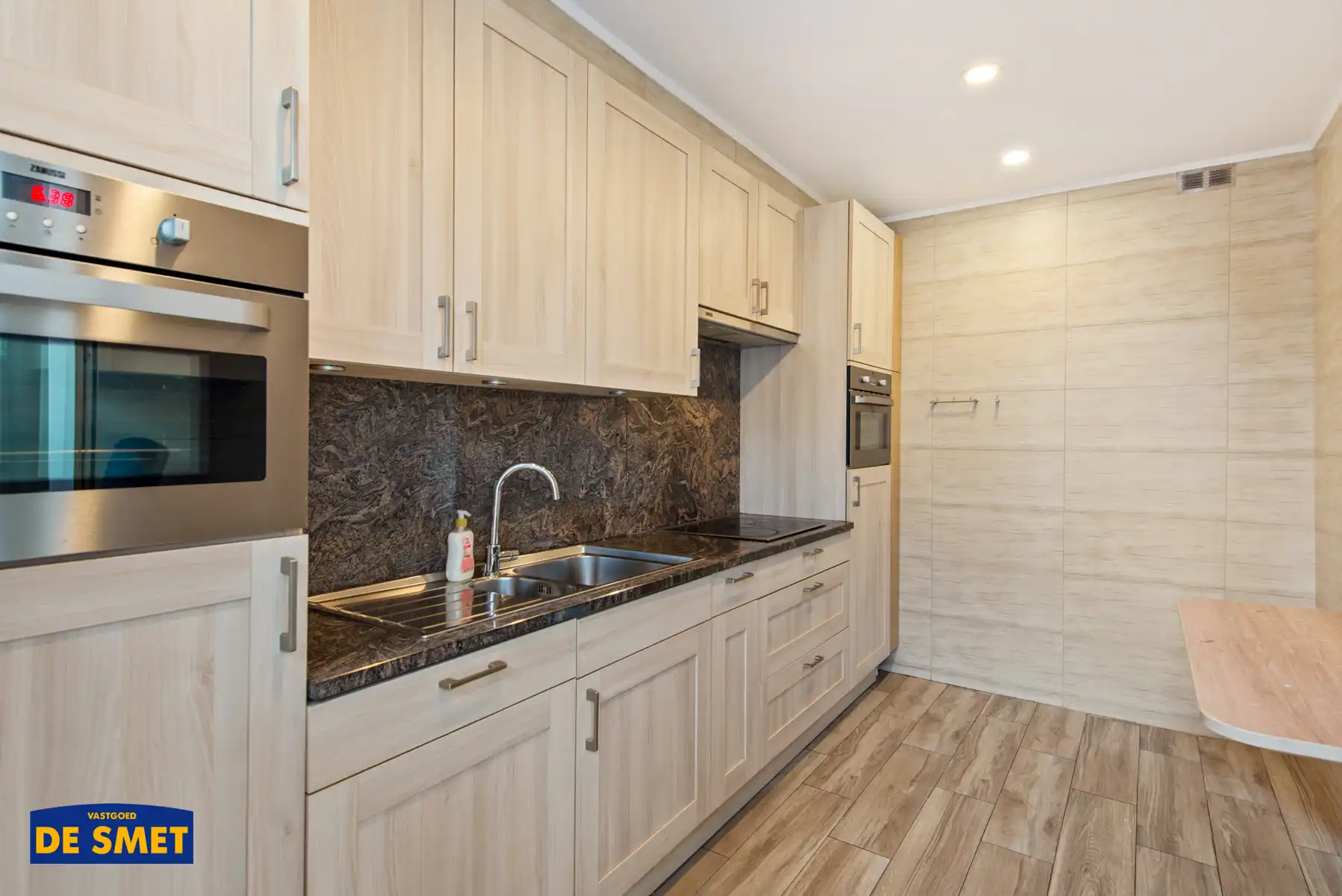 Centraal gelegen appartement met terrasje voor- én achteraan foto 8