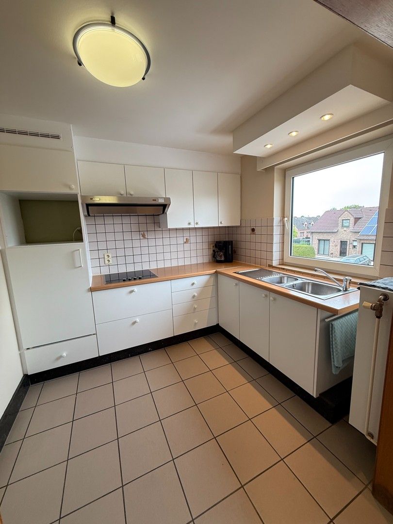 Rustig gelegen instapklaar appartement met 2 slaapkamers te Diepenbeek. foto 5