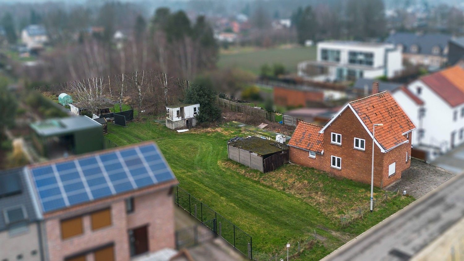 Te renoveren woning met veel mogelijkheden op een ruim perceel van 32a40ca te Lanaken! foto 16