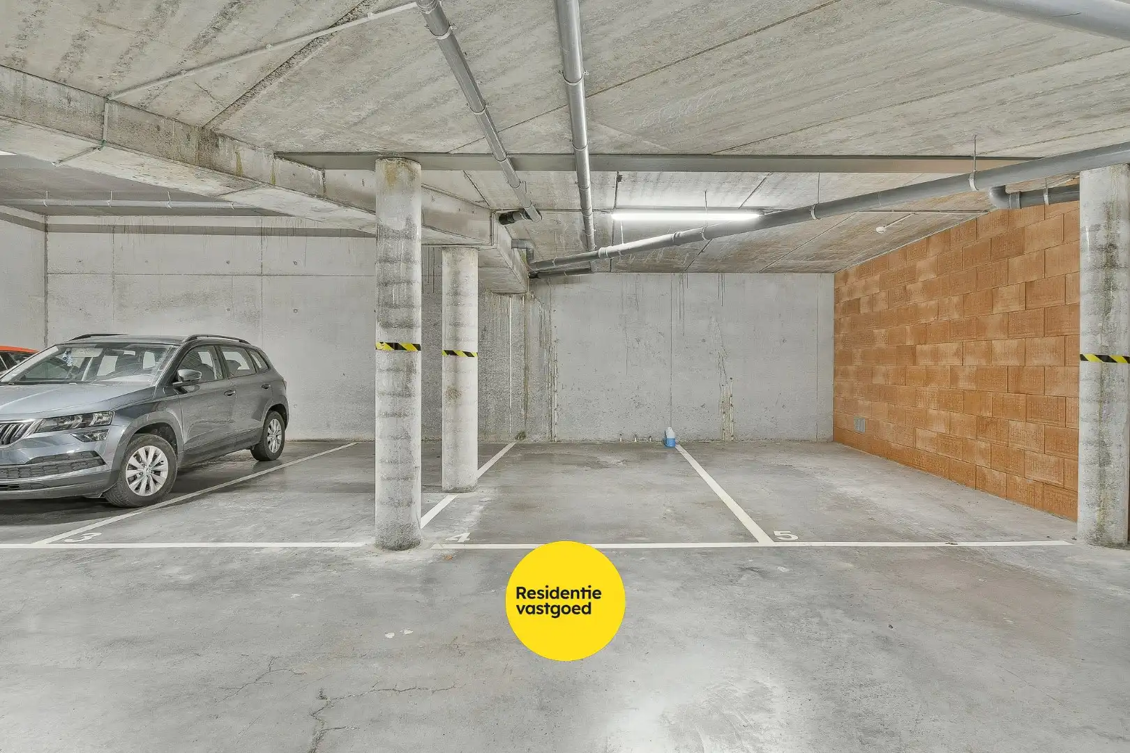 Ondergrondse parkeerplaatsen te koop in het centrum van Gistel foto 13