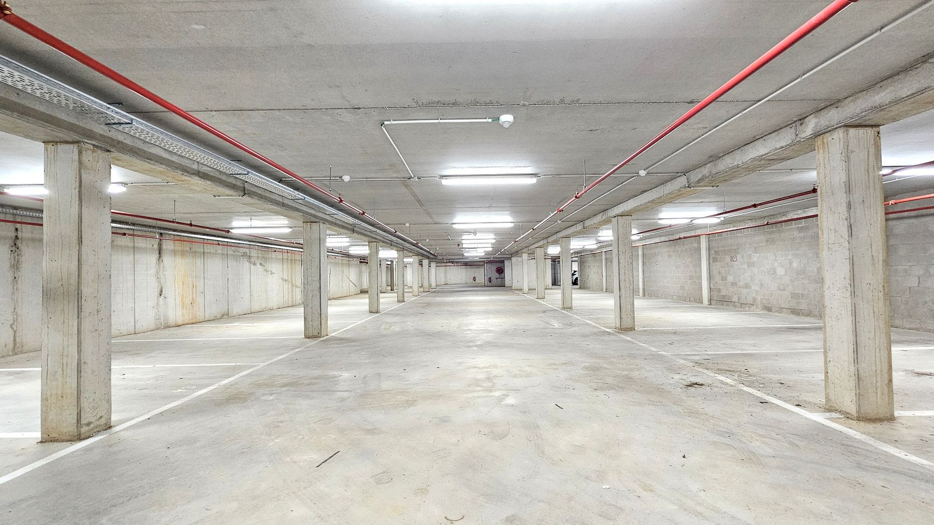 25 autostaanplaatsen in nieuwbouw foto 1