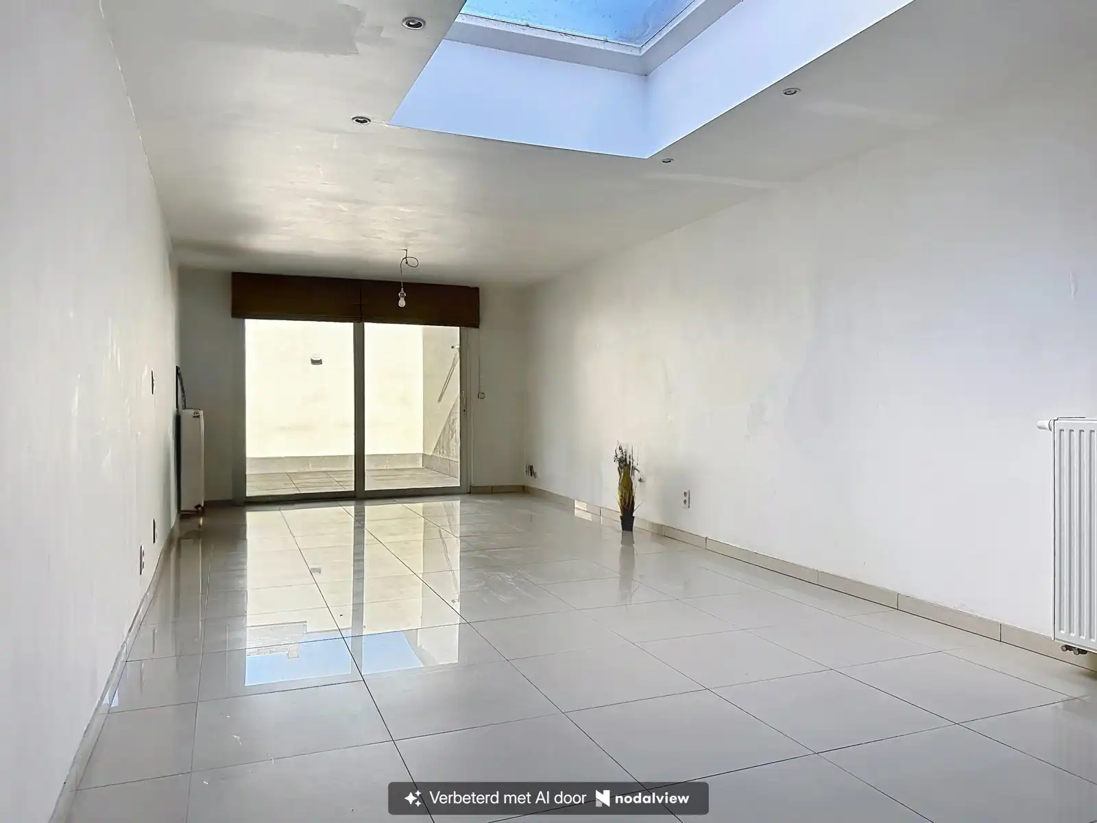 Instapklare, gerenoveerde woning met gezellige koer in hartje Niel! foto 5