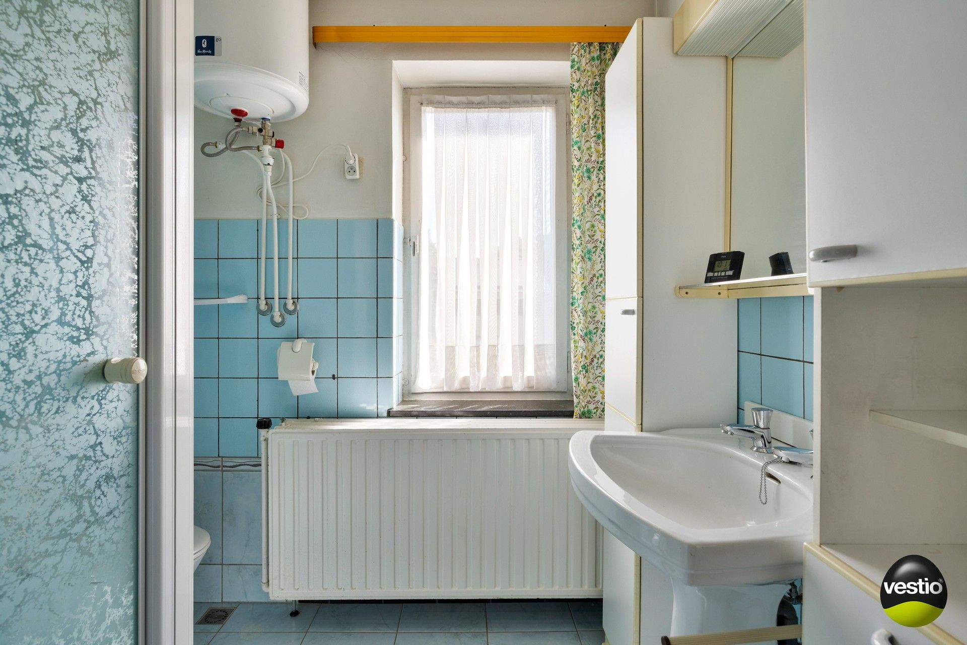 Charmante gezinswoning met drie slaapkamers op rustige, centrale ligging te Genk foto 14