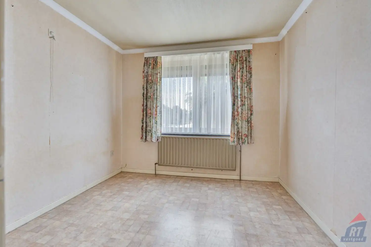 Rustig gelegen, op te frissen woning in Alken foto 15