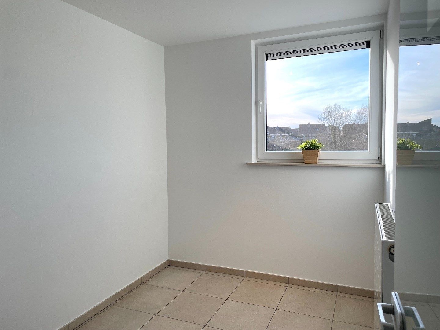 Uiterst lichtrijk appartement met heel groot terras en garage! foto 14