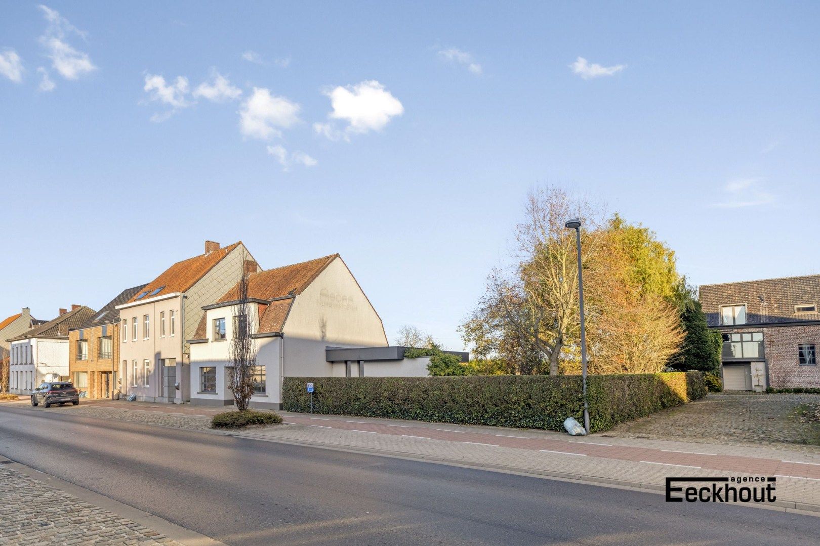 Ruime halfopen woning met prachtige aangelegde tuin en carport voor 2 wagens! foto 30