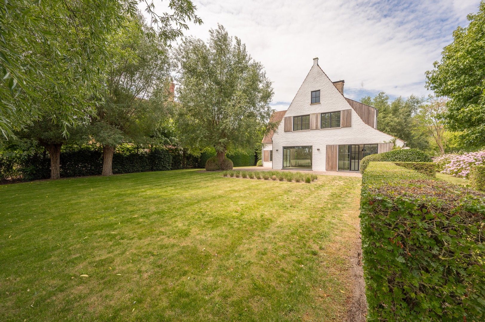 Alleenstaande villa genietend van prachtige open zichten op de polders. foto 19
