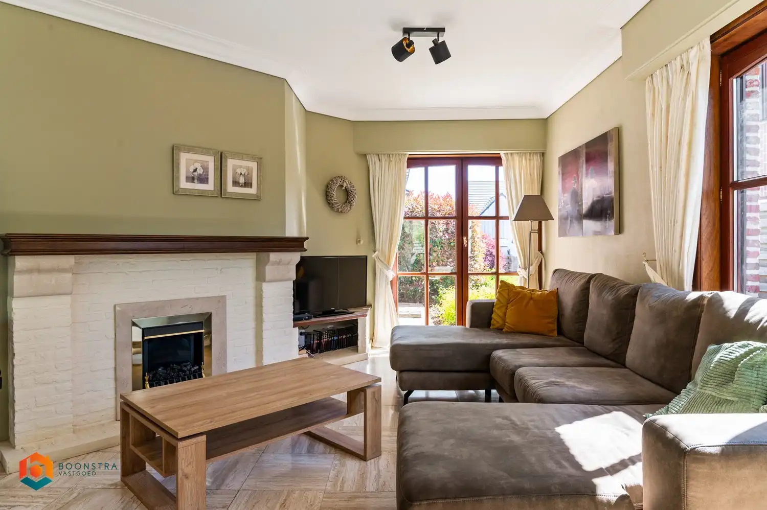 Gelijkvloerse woning met 3 slpkrs en prachtige tuin foto 4