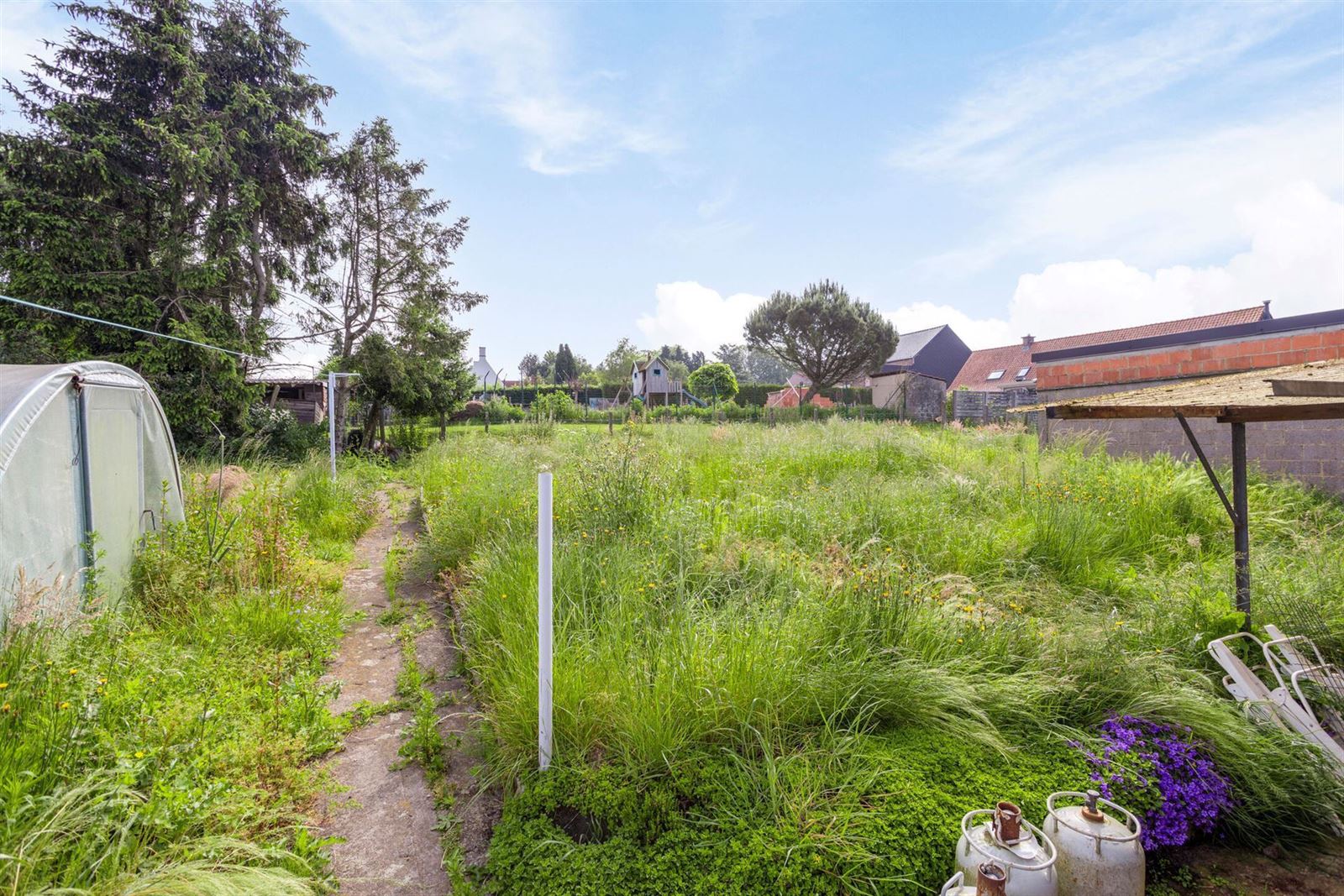 Statige woning met 4 slaapkamers op een terrein van 29are foto 24