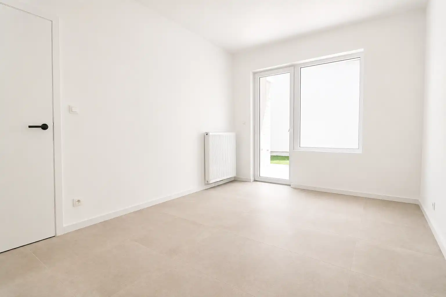Instapklaar 2-slaapkamerappartement met tuin. foto 3