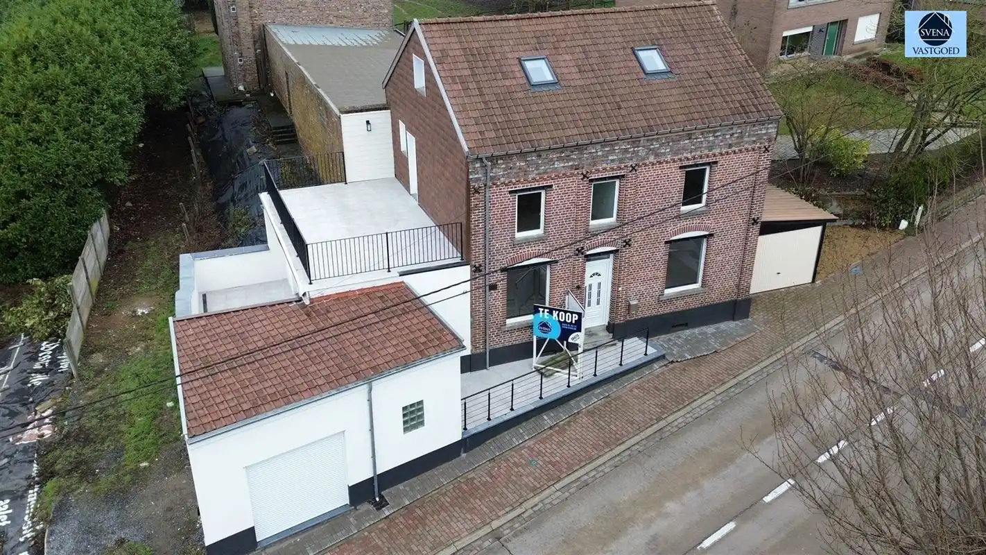 ZEER RUIME WONING MET 4 SLAAPKAMERS EN 2 GARAGES foto 20