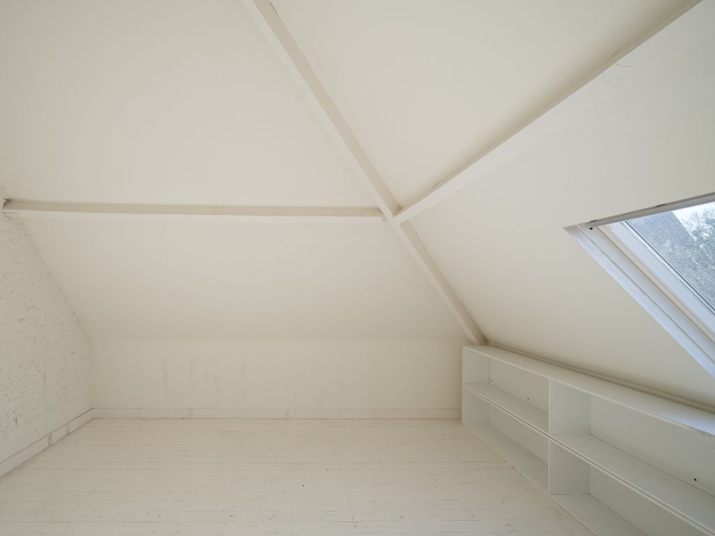 Voormalige dokterswoning met praktijkruimte en stadstuin foto 19