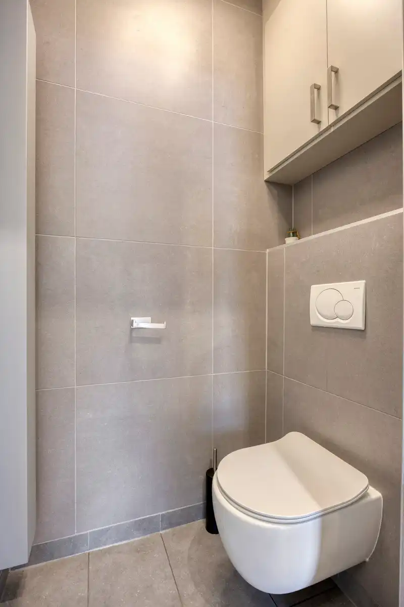 Modern en energiezuinig gelijkvloers appartement vlabij centrum foto 16
