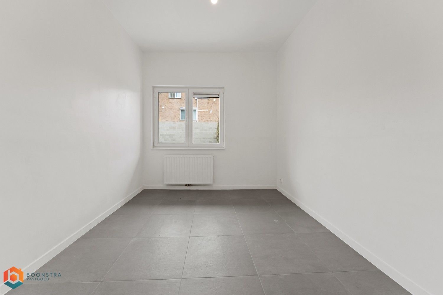 Gelijkvloers app met 2 slpkrs, tuin en garage te Willebroek foto 15