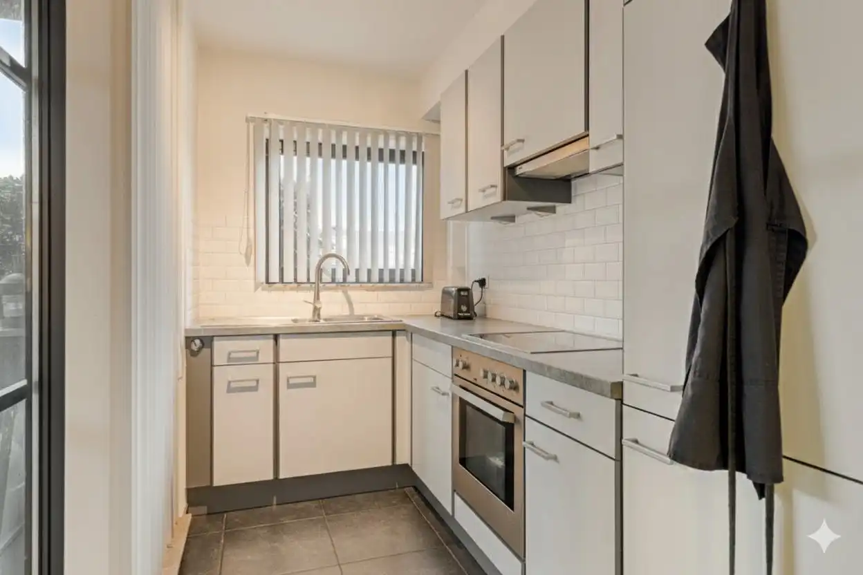 Gelijkvloers appartement met parking en tuintje te koop in Hasselt foto 6