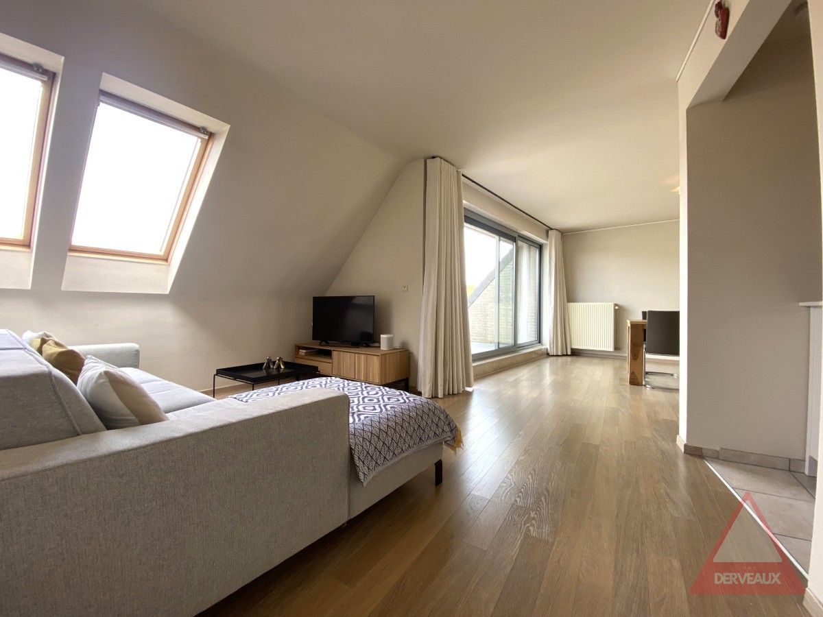 Rumbeke – Lichtrijk duplexappartement met 2 slaapkamers en garage foto 4