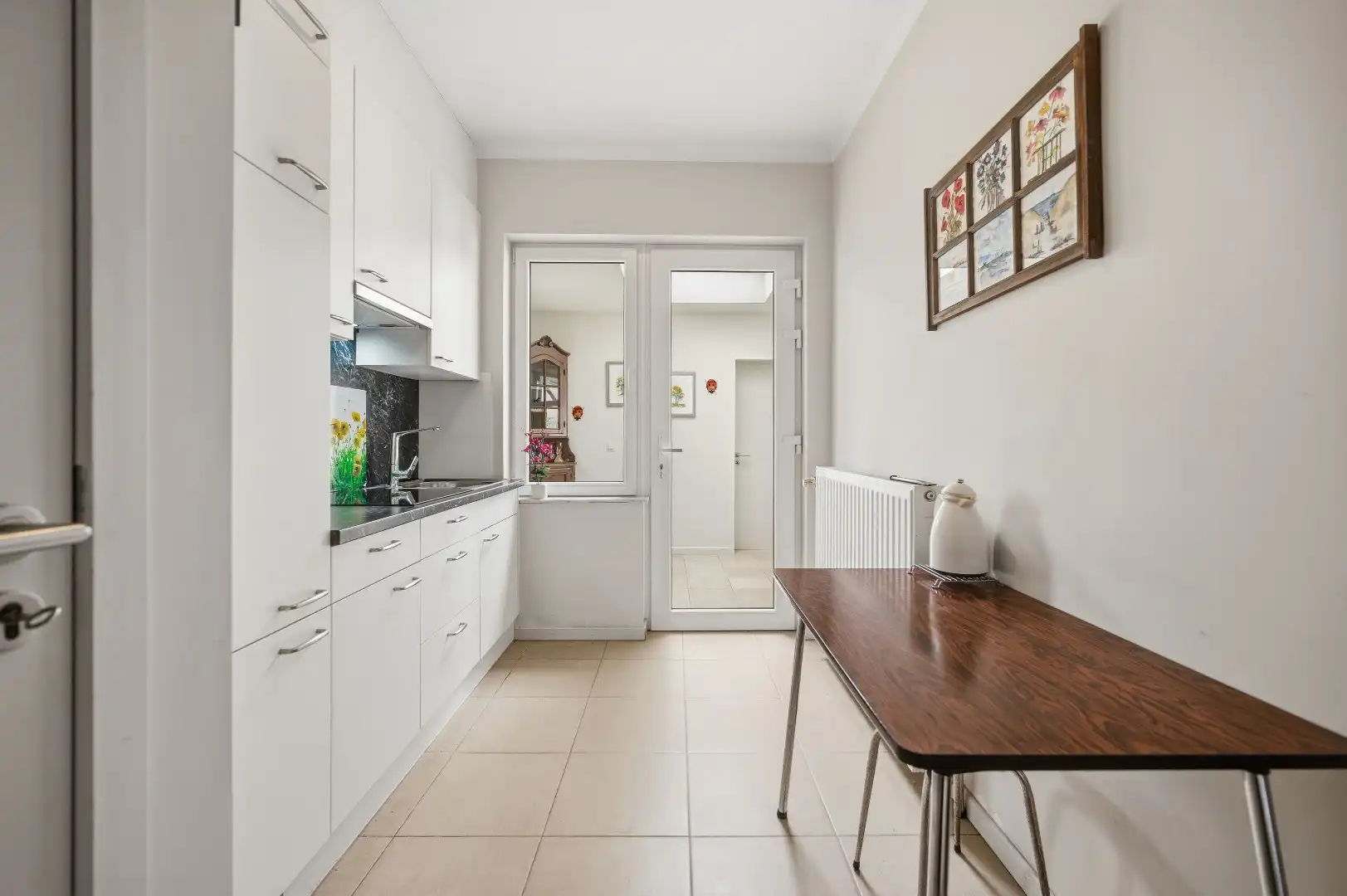 Ruime gezinswoning met 4 slpks, 2 badkamers, garage en grote tuin foto 11