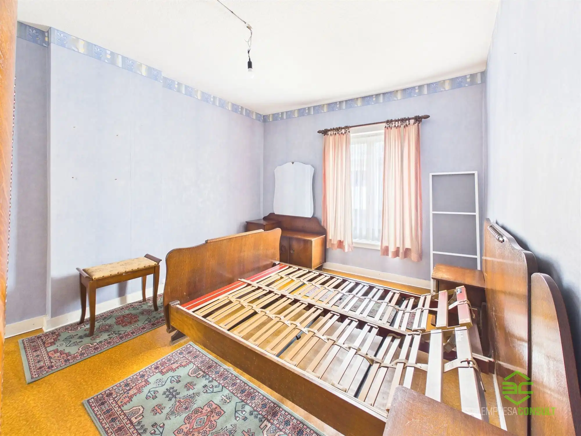 Centraal gelegen te renoveren woning met 3/5slpk! foto 14