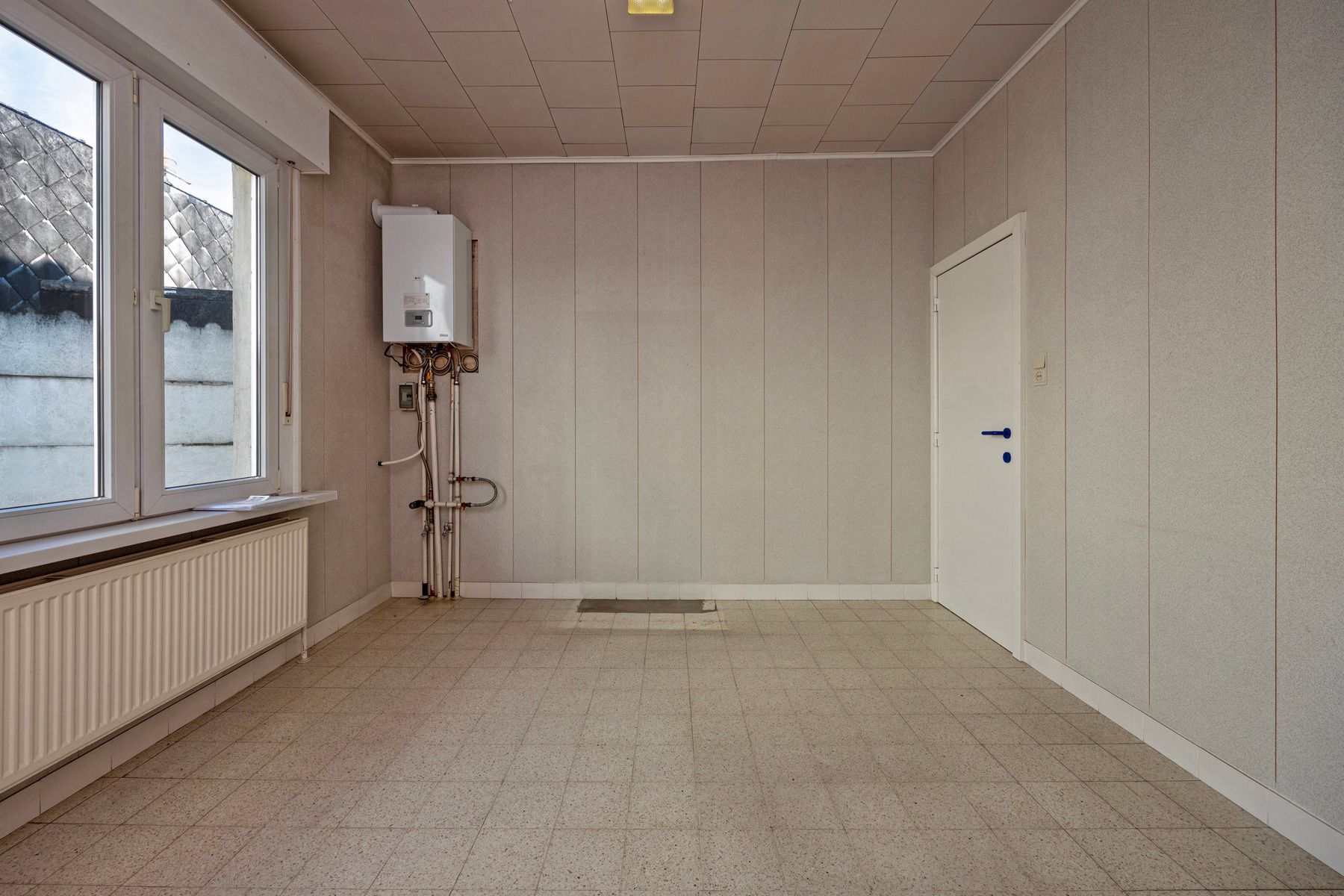 Handelshuis, ingedeeld als commerciële ruimte + appartement foto 6