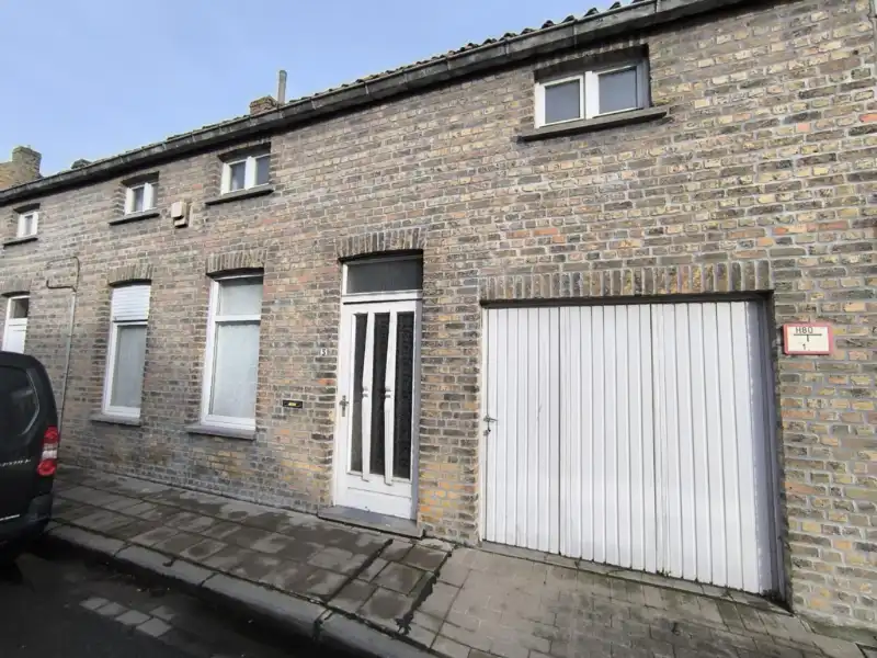 Rijwoning met garage foto {{pictureIndex}}