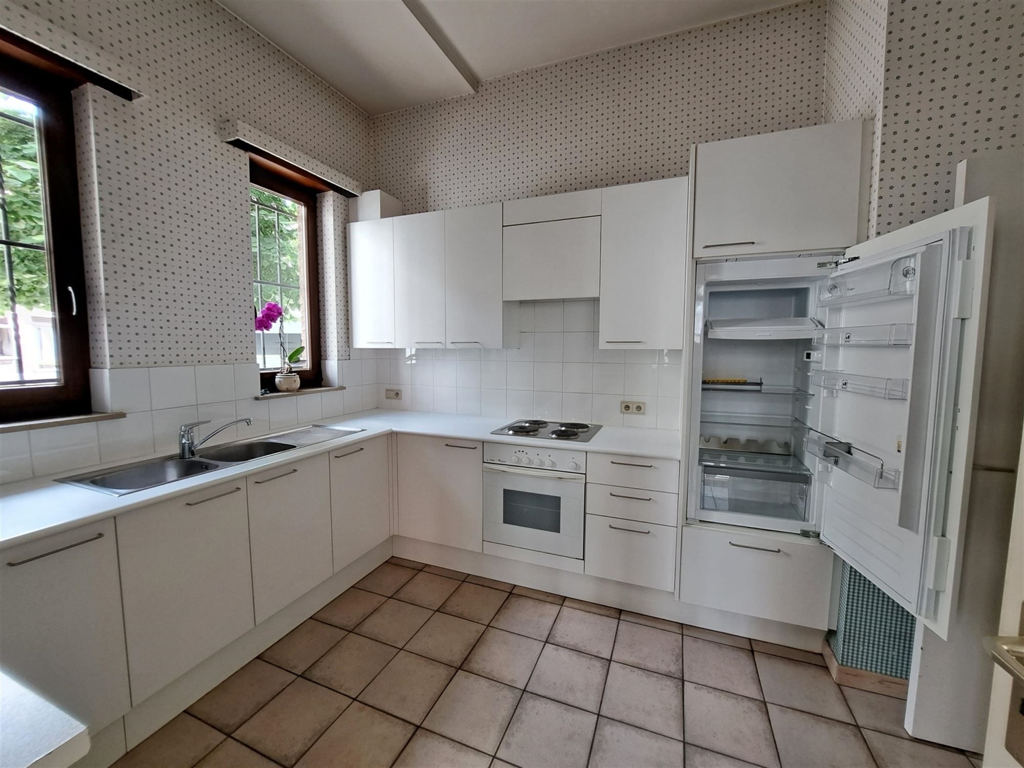 Ruim gelijkvloers appartement met 2 slaapkamers foto 2