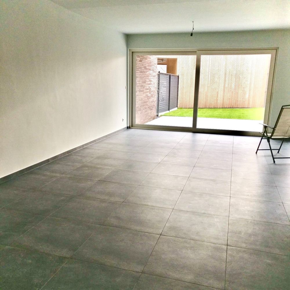 Modern gelijkvloers appartement met terras en tuintje in Opitter foto 6