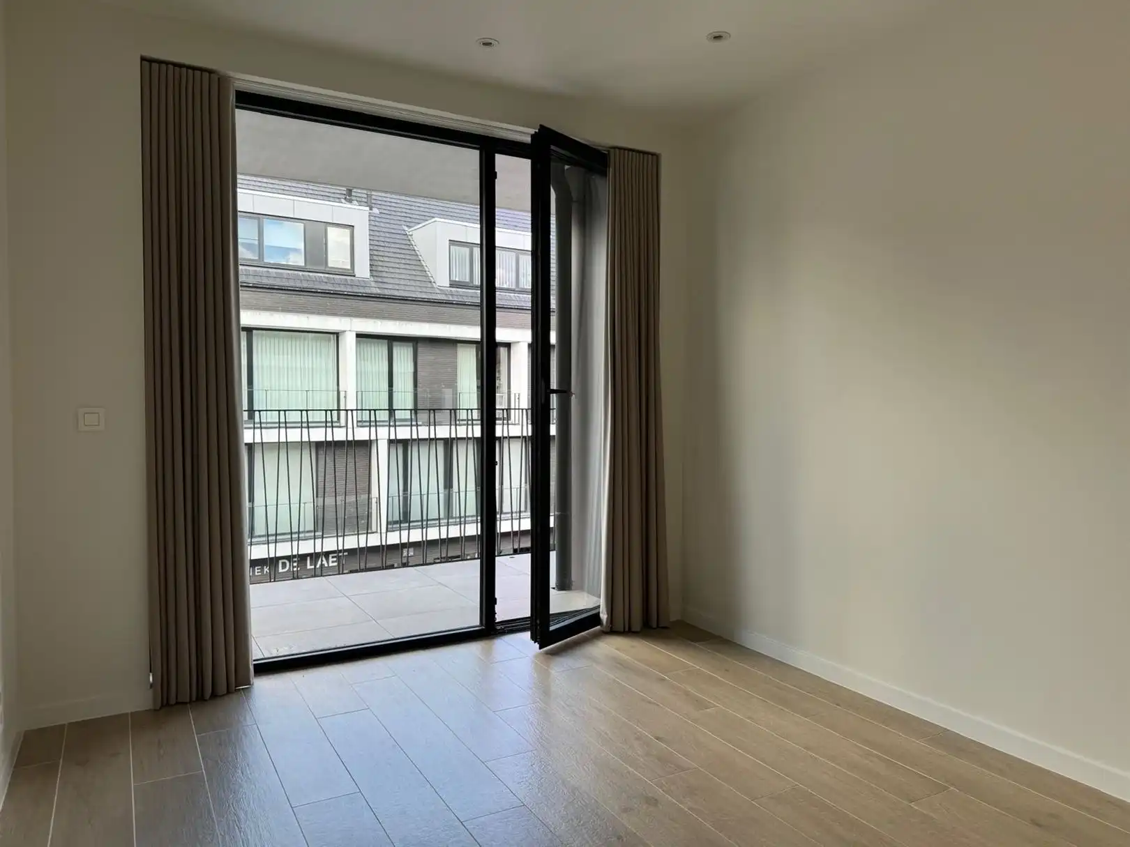 Appartement met twee slaapkamers, groot terras en autostaanplaats foto 16
