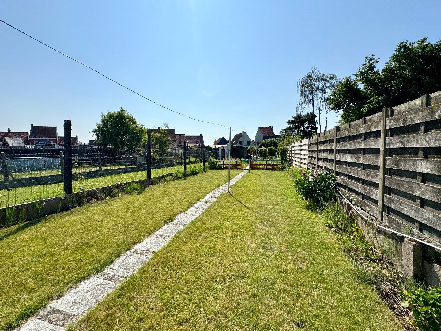 RIJWONING MET  3 SLPKS, GARAGE EN TUIN foto 3
