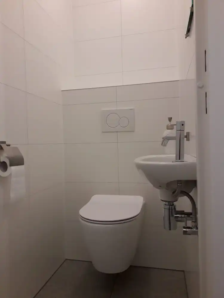 Volledig gerenoveerd gelijkvloers appartement met terras, berging en afgesloten garage foto 6