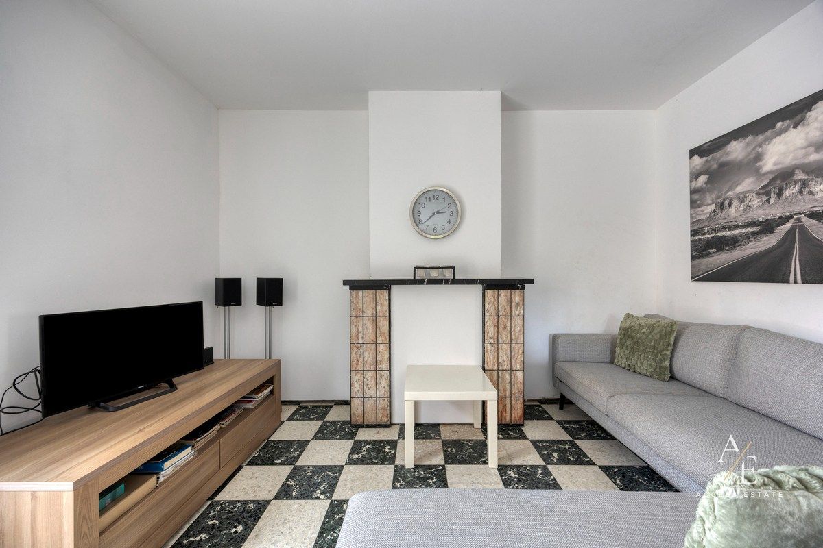 Ruime halfopen woning met potentieel in rustige straat te Melle foto 7