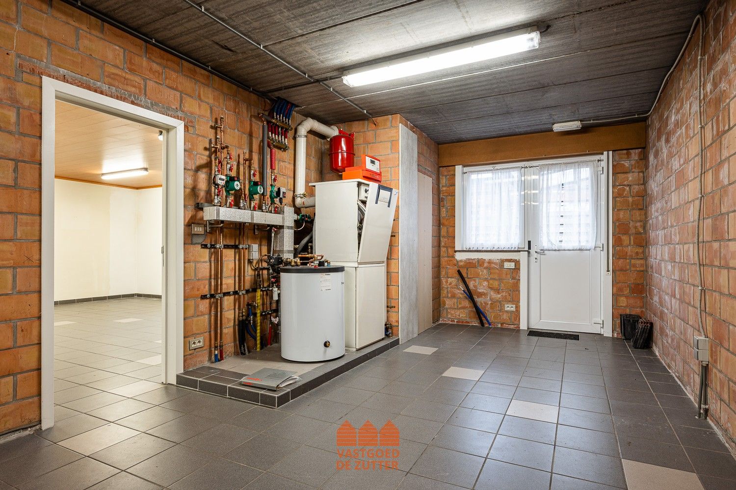Ruime woning met garage en verhuurde studio foto 21