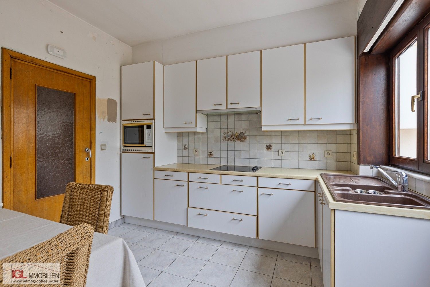 Rustig gelegen driegevelwoning met zonnige tuin & extra uitbreidingsmogelijkheden foto 6