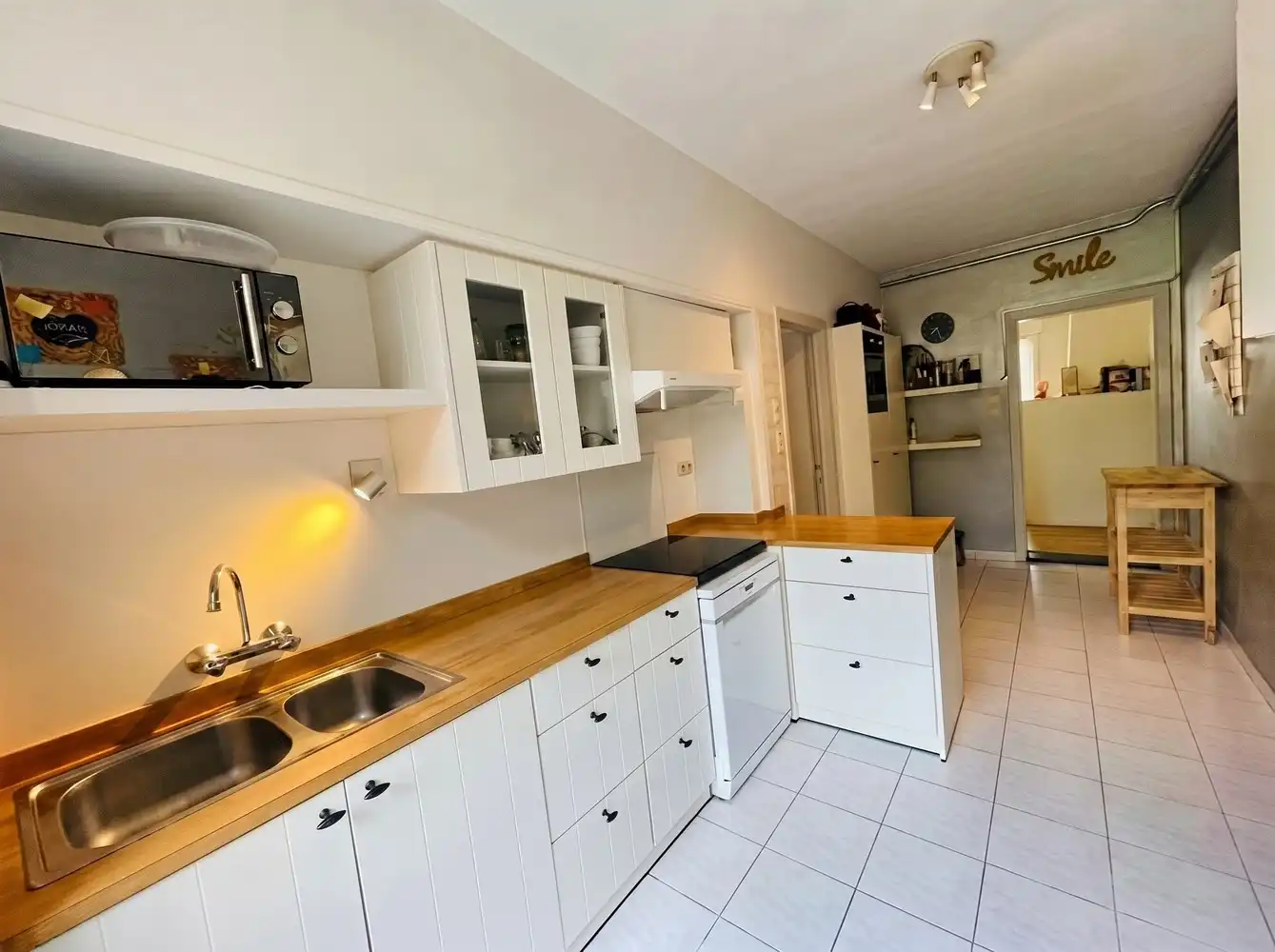 Assebroek INSTAPKLARE CHARMANTE GEZINSWONING, HALF-OPEN BEBOUWING met GROTE ZONNIGE TUIN, OPRIT en GARAGE foto 6