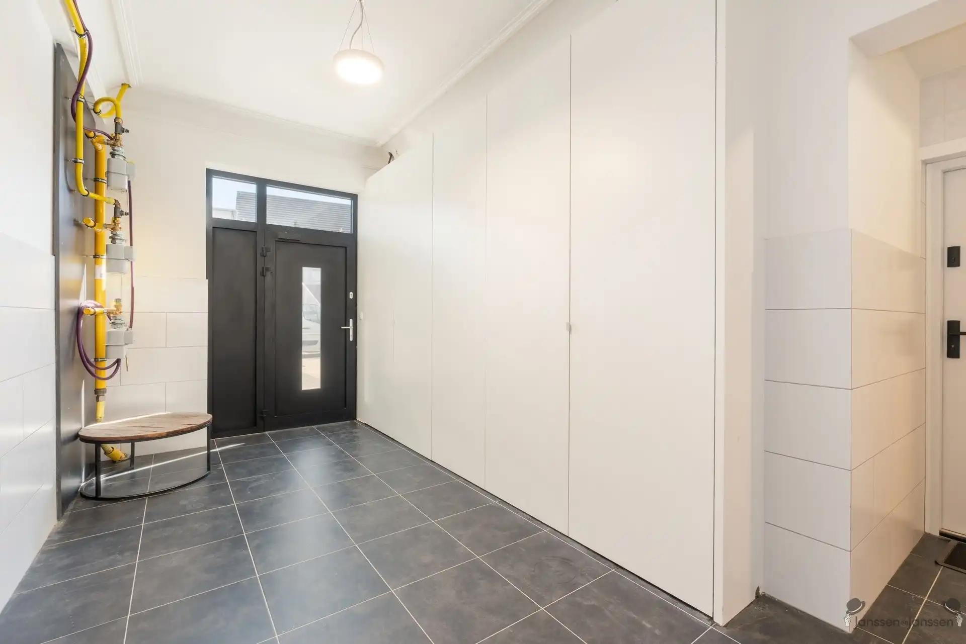 Luxueus gerenoveerd duplexappartement met 4 slaapkamers en private tuin foto 22