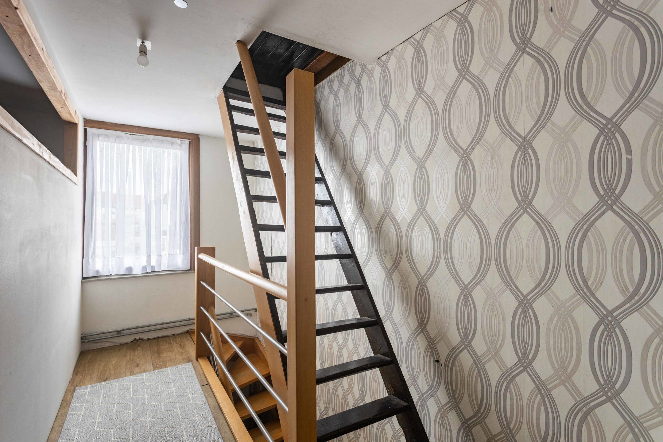 Interessante aankoop: op te frissen woning vlakbij centrum. foto 11