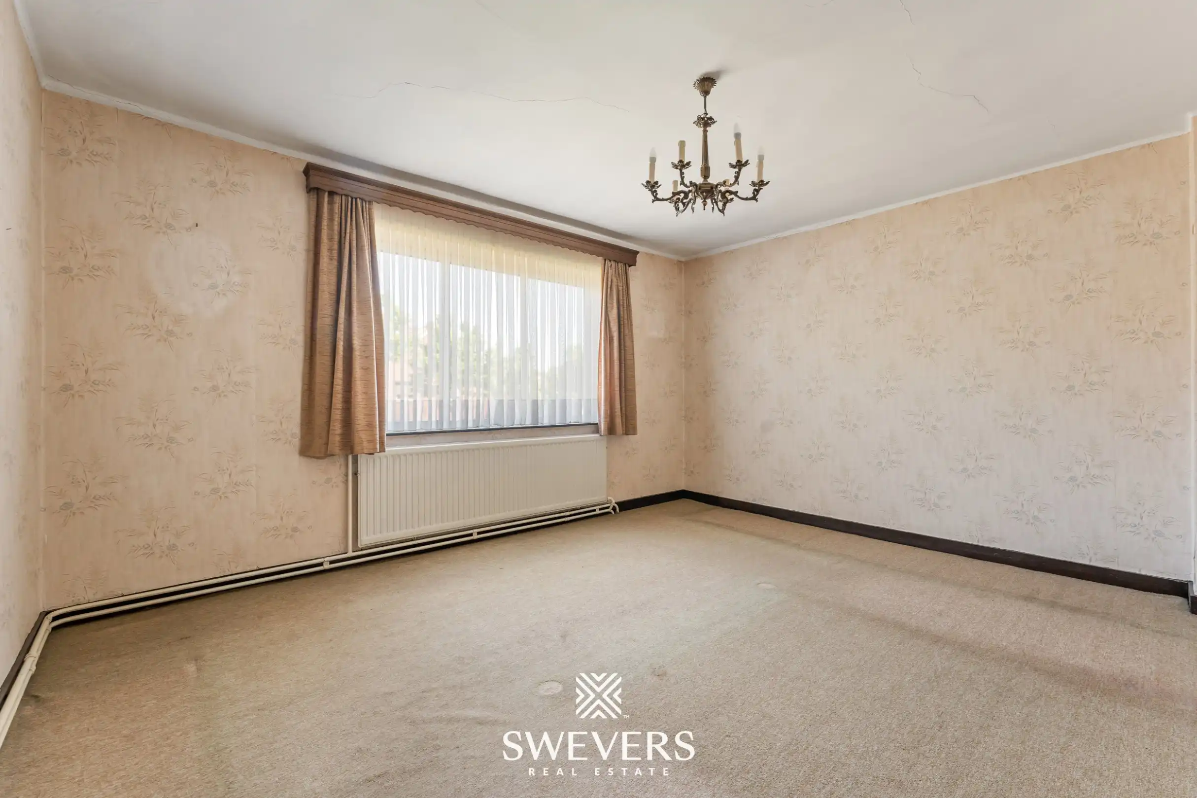 Te renoveren woning met grote tuin en 5 slaapkamers in Genk foto 15
