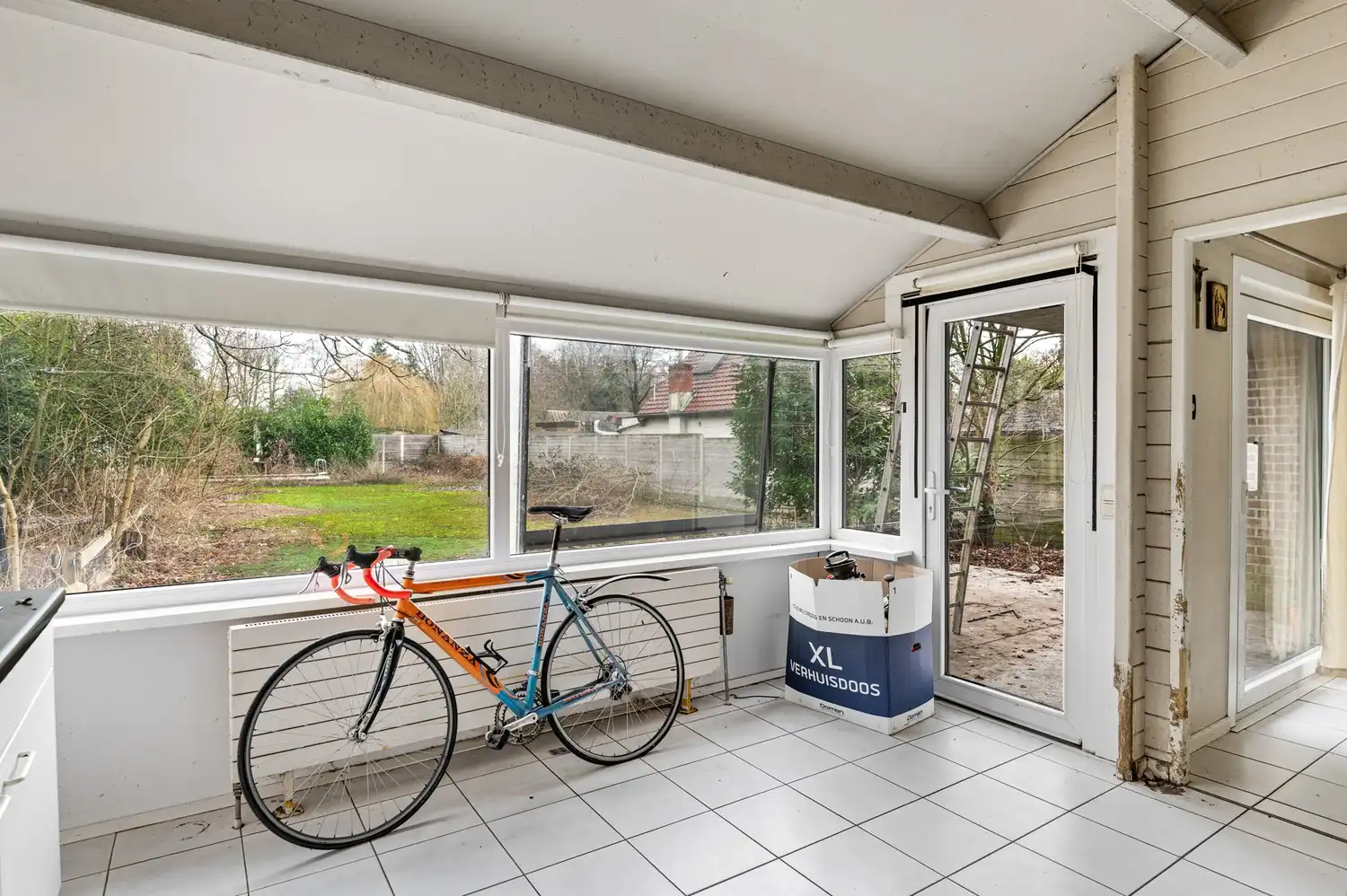Te renoveren open bebouwing met 3 slaapkamers & grote tuin te Schoten! foto 6