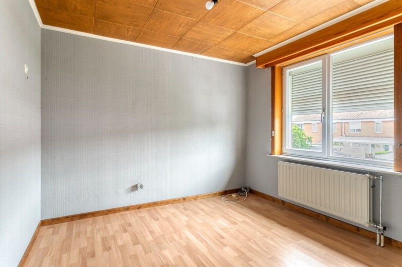 Op te frissen woning met potentieel gelegen in een rustige buurt TE KOOP in Desselgem. foto 11