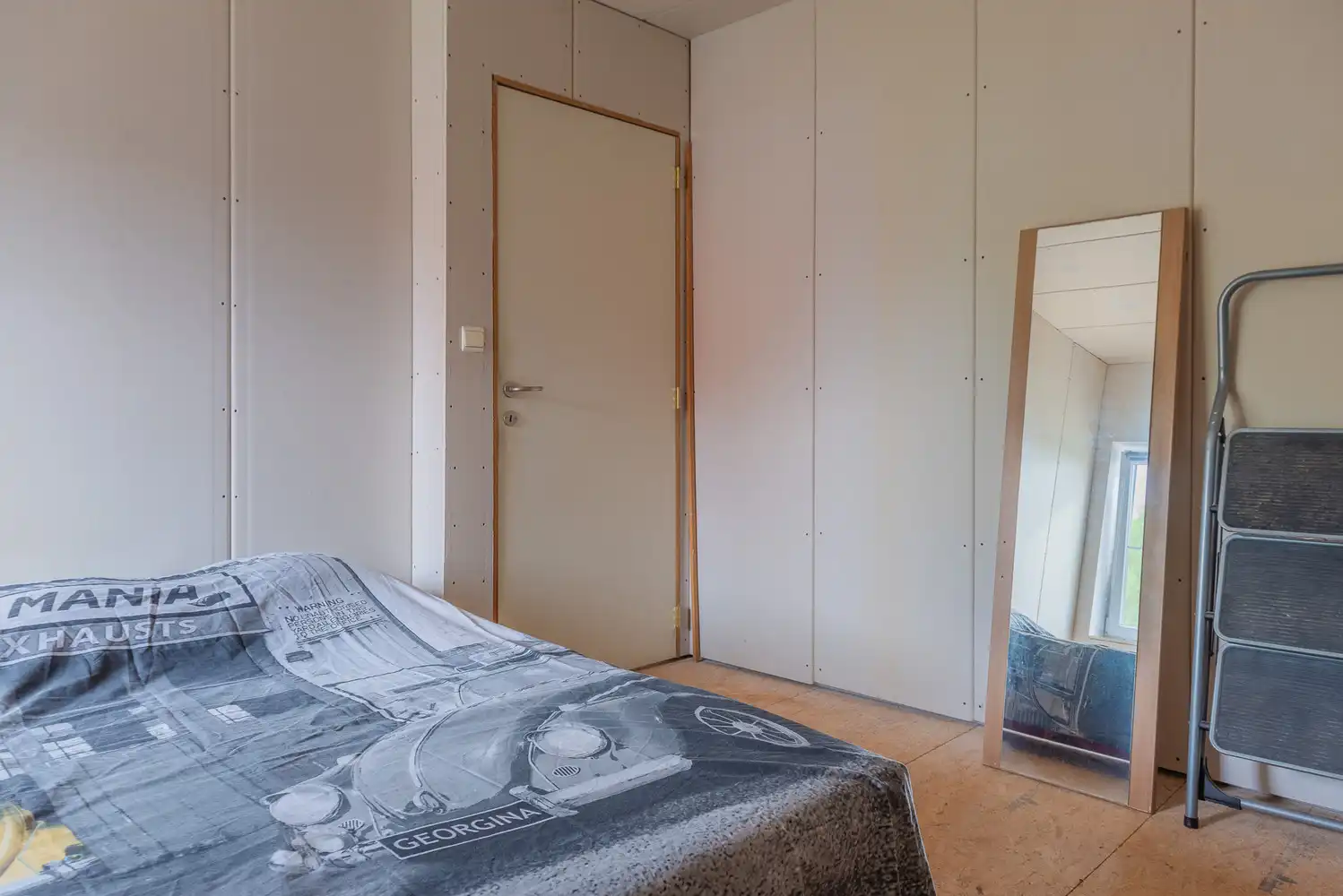 Halfopen woning op een perceel van 532 m² met ruime garage/werkplaats foto 15