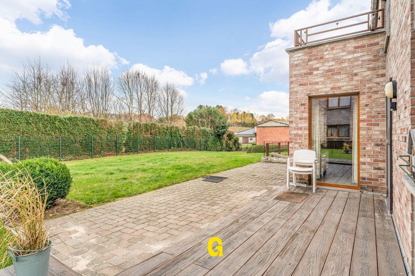 Degelijk (rolstoelvriendelijk) gelijkvoersappartement met terras uitgevend op de tuin, afsluitbare garage en berging foto 2