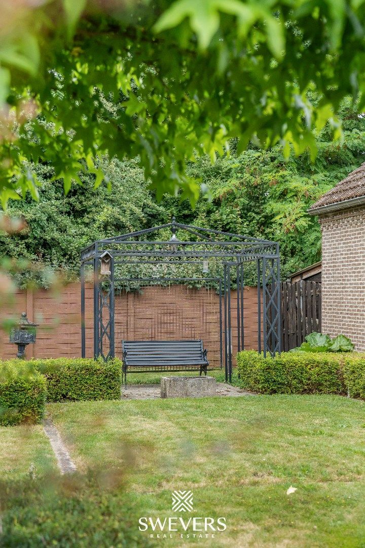 Rustig gelegen ruime woning met 3 slaapkamers op een zonnig perceel van 9a foto 34