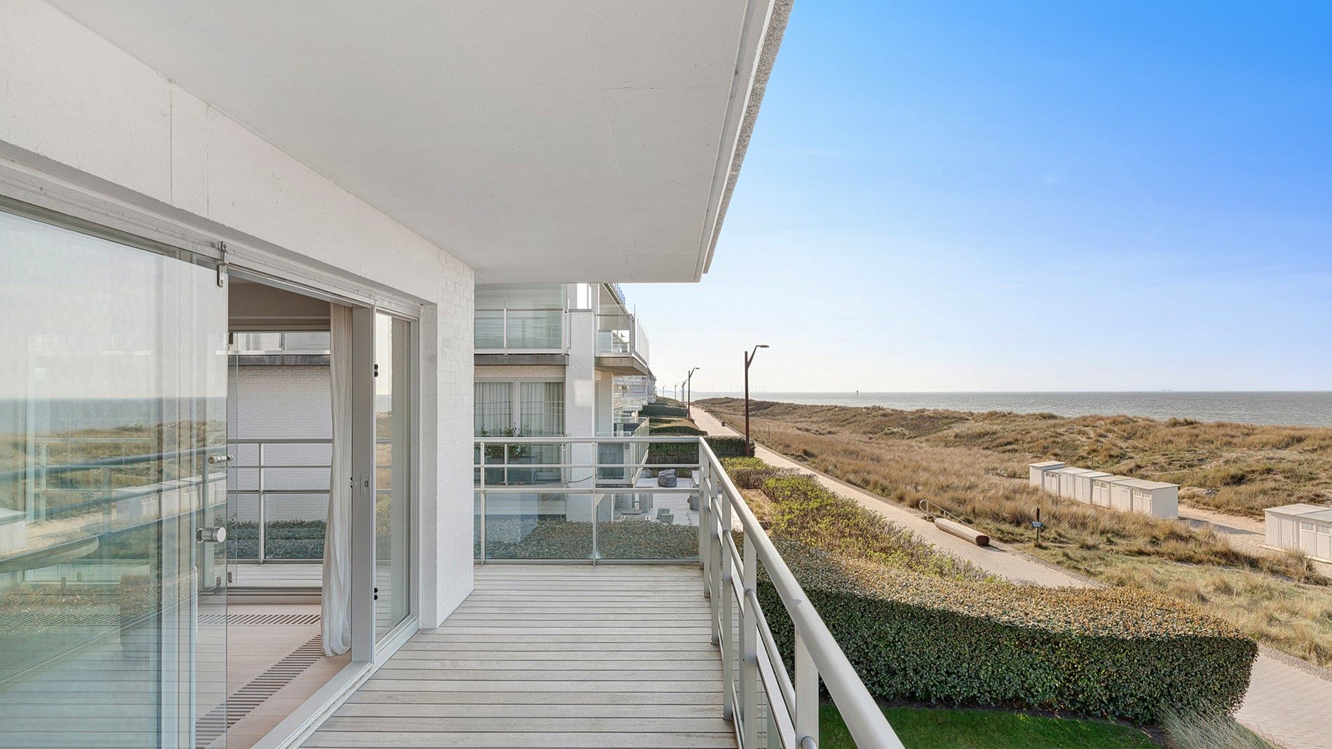Uitzonderlijk hoekappartement met adembenemend zee-en duinenzicht langs de Wandeldijk in het Zoute foto 2